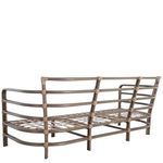 Front perspective of sofa with white cushions on oak frame with woven binding details