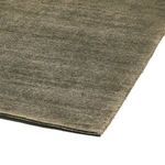 Side angled view of Blanton Outdoor Rug showing rug thickness and pile density