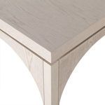 Extreme close-up showing seam detail where nesting tables slide under main surface
