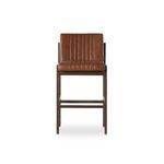 Alternate front view of stool focusing on leather upholstery and frame angles