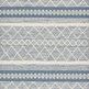 Sawyer Teal Rug with bold, tonal geometric patterns and playful fringe in a blue and cream color palette