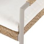 Close-up of woven rope texture on backrest showcasing interlaced pattern