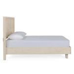 Side profile of Reece Bed showing flat headboard and frame height with one pillow