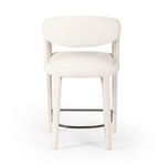 Rear view highlighting the full backrest curve and rear leg alignment with horizontal footrest.