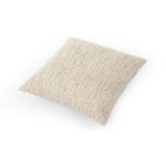 Callum Pillow shown at a 45-degree angle highlighting its plumpness and soft boucle weave