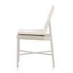 Right angled view of chair with cushion showing slim, sleek outdoor frame design