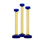 Triplet of yellow and blue glass candle holders viewed from base level on white background