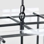 Close-up of black iron chain and top frame connection with hanging loop detail