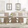 Levi Slipcover Dining Chairs styled around rustic wooden dining table in bright, modern dining room
