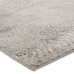 Close-up of the Dune rug corner showing plush texture and muted color details
