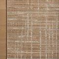 Wade Clay Silver Rug corner on hardwood floor highlighting subtle linear motifs and fringe detail
