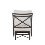 Rear view of chair with white cushions showing X-frame backrest and metal tag
