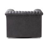 Side view of Watson Swivel Chair showing vertical channeling on armrest and back