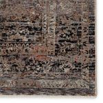 Detailed close-up of Elio Oriental Gray Black rug corner showing intricate border and muted color palette