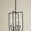 Kael Lantern hanging against beige wall, angled view showing interior and outer frame