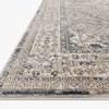 Low angled close-up showing subtle texture and plush pile of the rug's border area