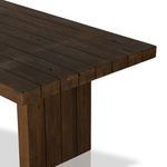 Angled corner view focusing on joinery between tabletop and leg panels