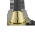 Close-up of brass base with on/off switch unlit on textured gray lamp body