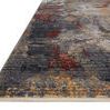 Close-up angled view highlighting fringe and low pile texture on Samra dark grey spice rug