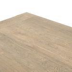 Close-up of tabletop texture emphasizing faux rustic oak veneer with wormwood oak details