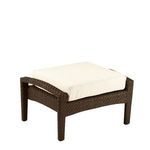 Outdoor ottoman with dark brown woven base and thick off-white cushion