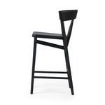 Alternate angled front-side perspective of the black Buxton Drifted Oak Bar Stool showing structured leg frame