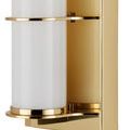 Close-up showing fine polished brass finish and the precise join between brass and milky glass tube