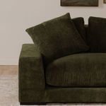 Cushion and armrest close-up highlighting the corduroy fabric and thick pillow of the sectional