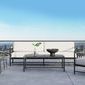 Pietra Loveseat in outdoor rooftop setting with white cushions, paired with matching table and chairs under clear sky