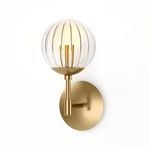 Sunset Sconce lit with warm light against white background showing glowing filament bulbs