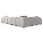 Back angled view highlighting clean lines and blocky low-profile legs on the sectional