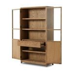 Interior drawer extended from cabinet showing smooth oak wood and dovetail joinery