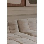 Lino slipper chairs assembled into modular sectional with round wooden table and beige rug