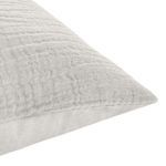 Close-up angled view highlighting the textured grid linen weave and fabric softness