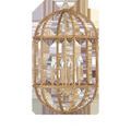 Charrette Lantern from a front view revealing symmetrical rattan reed loops