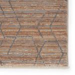 Close-up of edge with visible fringe and detailed geometric lattice texture