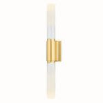 Colrain Wall Sconce illuminated with warm light glowing softly through its frosted white glass shades