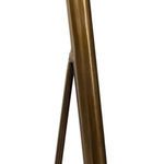 Brushed brass finish and triangular frame detail of Egon floor lamp’s supporting bar