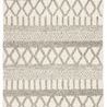 Rectangular handmade rug with gray and white tribal-inspired geometric patterns in Scandinavian wool design