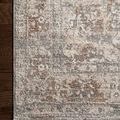 Side view detail of rug edge and pile texture highlighting pattern and color blend on dark hardwood floor