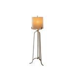 Angled view of glowing floor lamp illuminating soft shadow on the ground