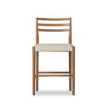 Front view showing slim smoked oak frame with horizontal ladder back and padded natural seat