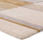 Close-up showing plush texture and pile height of Berkay Handmade Geometric Gray Rug's beige and taupe sections