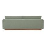 Back view of Vernon sofa showing smooth fabric upholstery and wooden plinth base