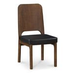 Single Kerr dining chair angled slightly to show seat thickness and walnut wood grain