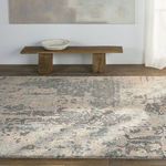 Rug displayed in a room next to a low wooden bench and a ceramic dish
