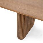 Close-up of fluted wood texture on one table leg with visible grain and protective semi-gloss finish