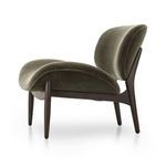 Opposite profile side view of the olive chenille chair showing sleek leg positioning