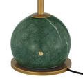 Close-up green marble base highlighting swirled marble texture with power indicator light