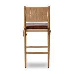 Rear view showing woven paper cord back with leather cushion ties on each side